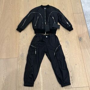 Matching Versace jacket and pants with really fun zipper details. New wi…